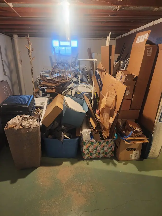 Roll-off dumpster container at job site for 8 Yard Dumpster Rental in Belvidere